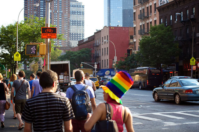 People on the street wearing rainbow attire