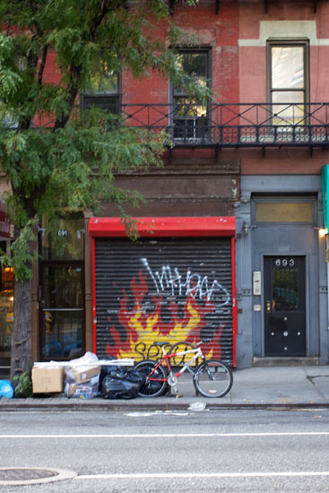The exterior of the now-closed Hell's Kitchen Pizza
