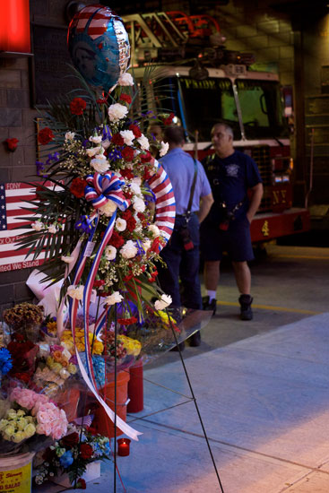 The flower arrangements at the Engine 54/Ladder4 firehouse