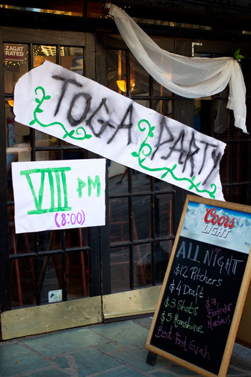 Signage for a toga party at Bar Nine