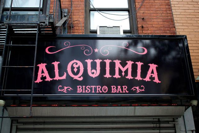 The signage for Alquimia