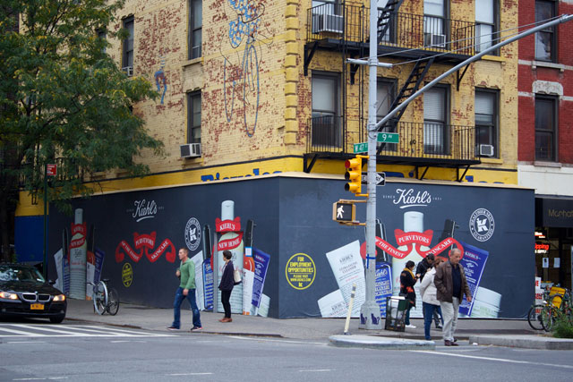 The branded plywood surrounding the future Kiehl's store