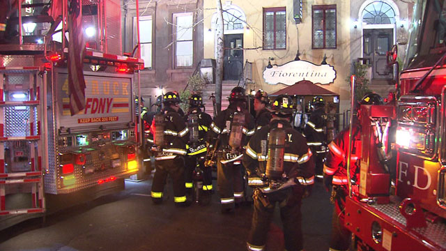 Firefighters responding to the alarm on W 46th St