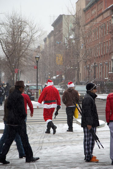 Santas wandering 9th Ave