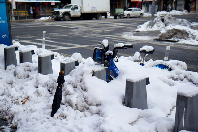A Citibike buried in snow