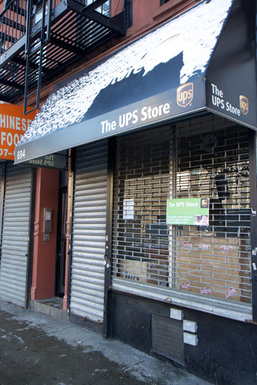 The exterior of the closed UPS Store franchise