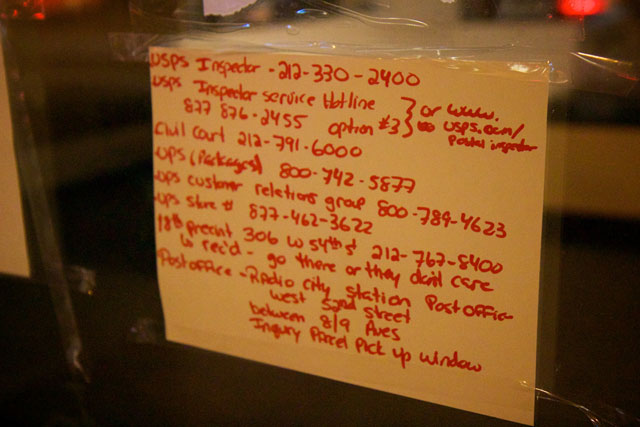 A notice from a customer on the outside of the closed UPS Store on W 57th