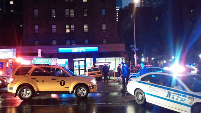 A taxi crashed into payphones on 9th Ave