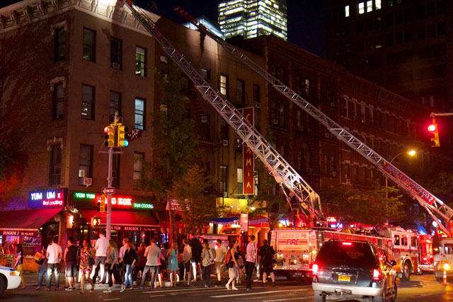 A crowd watching the incident on 46th St