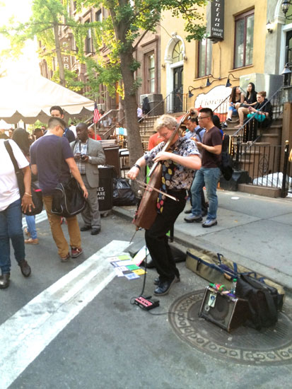 A musical performer at the Taste of Times Square festival