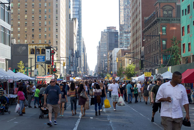 Crowds at the 8th Ave street fair
