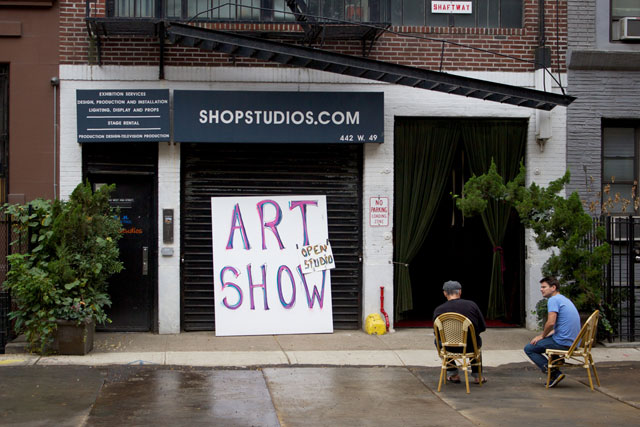 The signs for the art show at Shop Studios