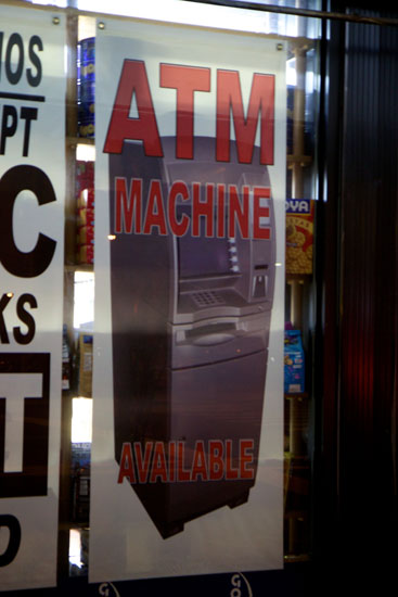 A poster advertising an “ATM Machine"